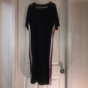Black dress with white and red strip on the sides.